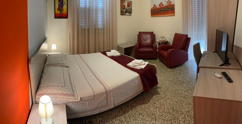 Postel nebo postele na pokoji v ubytování Erythrà Bed and Breakfast