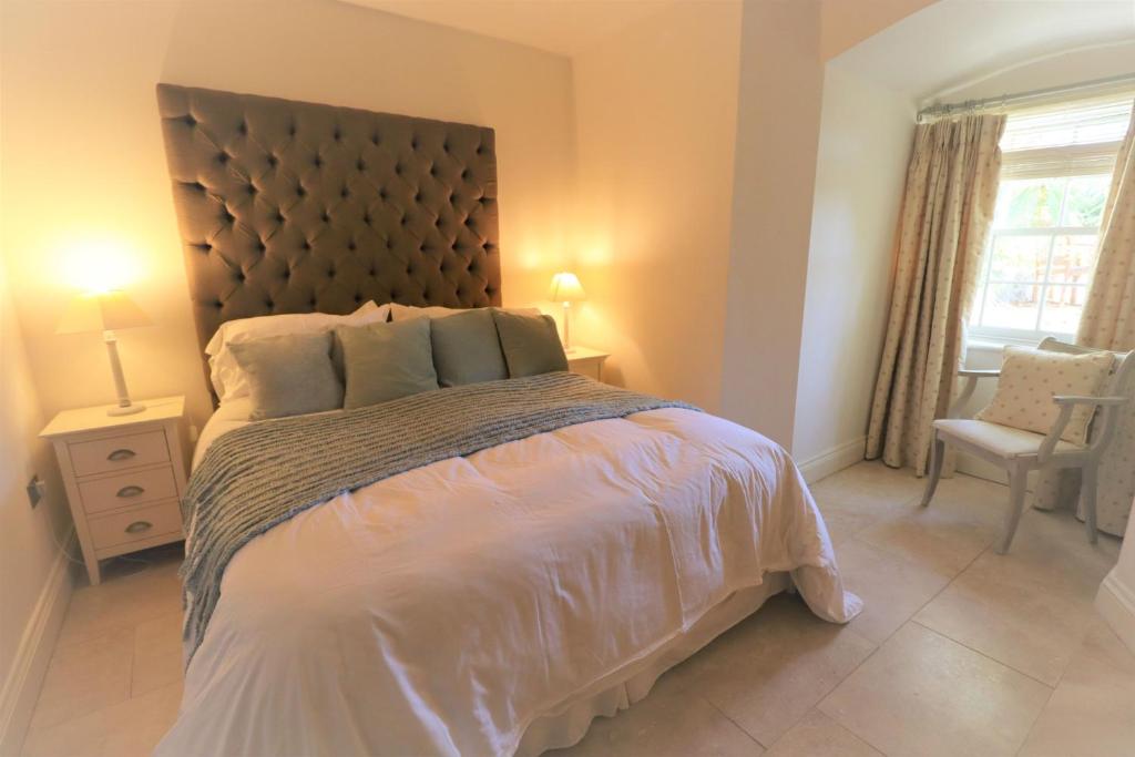 Postel nebo postele na pokoji v ubytování Villa Amanti Apartment