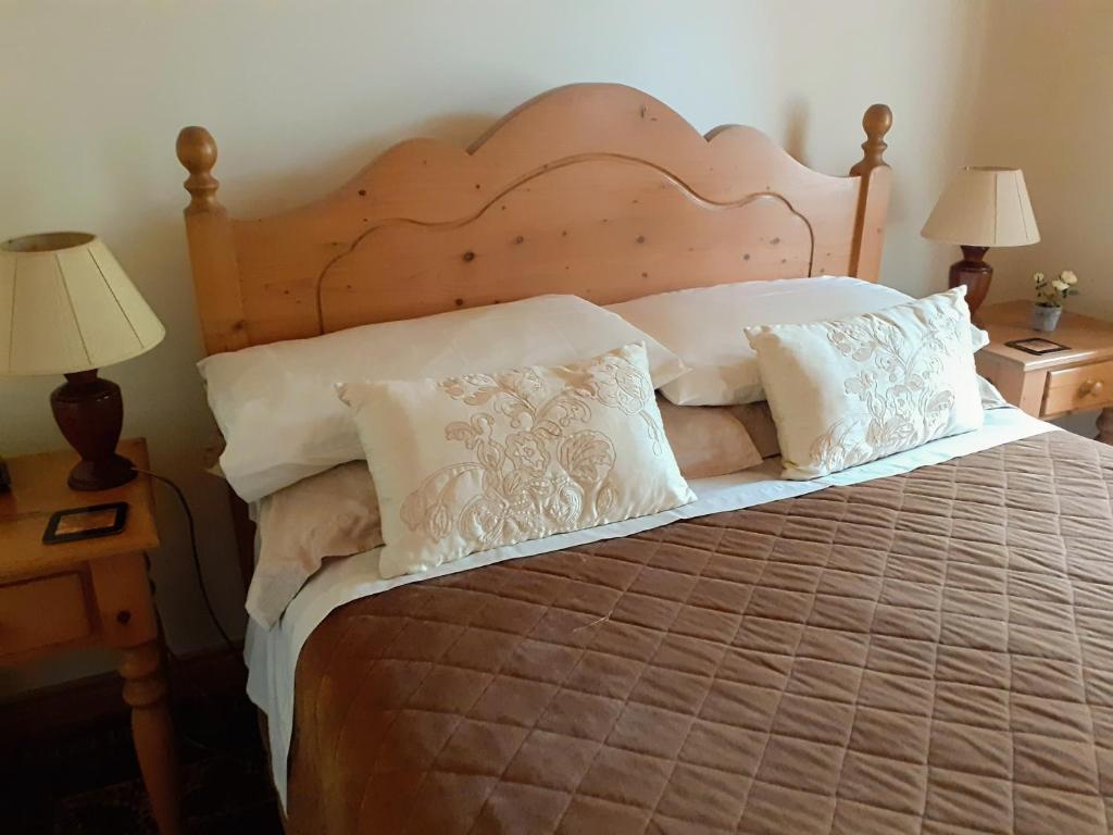 Postel nebo postele na pokoji v ubytování Cornode Cottage