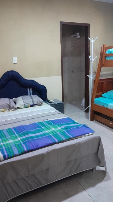 Postel nebo postele na pokoji v ubytování Hospedaje San Miguel