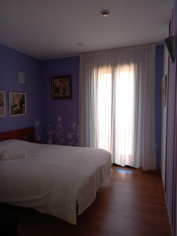 Postel nebo postele na pokoji v ubytování Hotel Plaza Inn