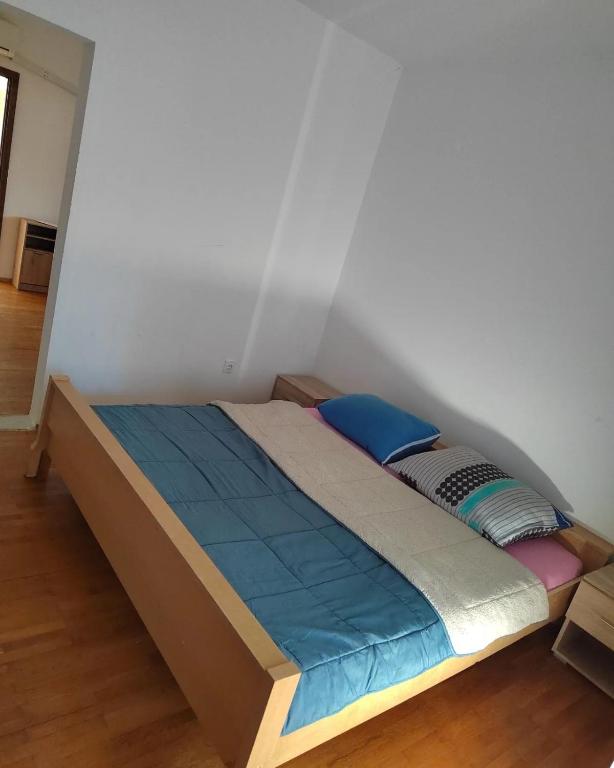 Postel nebo postele na pokoji v ubytování Apartmani Jela