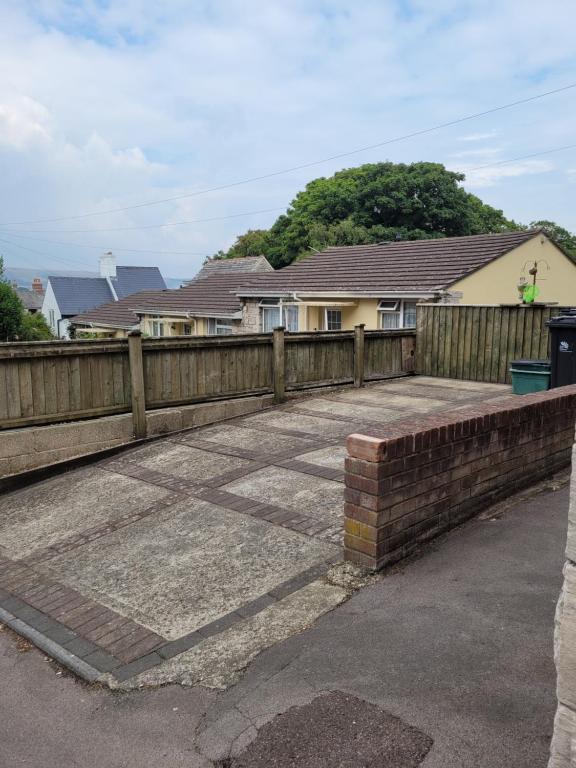 a wooden fence in front of a house at 39 Queens Road in Swanage