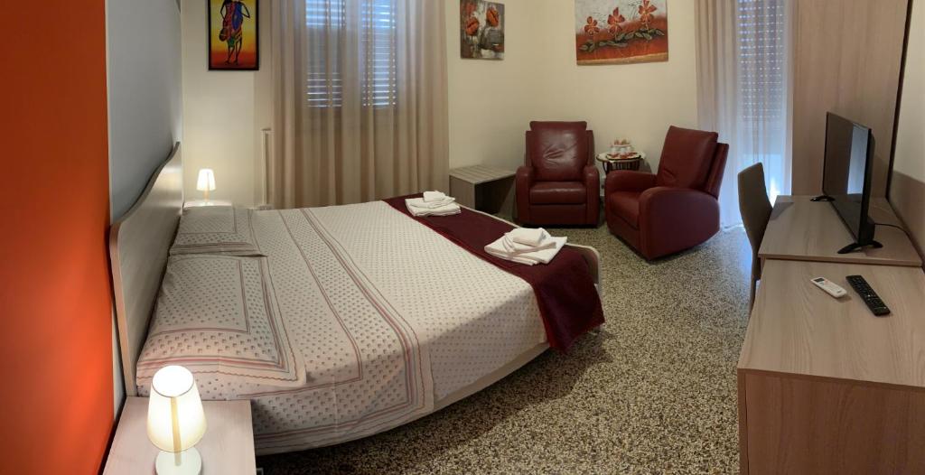 Postel nebo postele na pokoji v ubytování Erythrà Bed and Breakfast