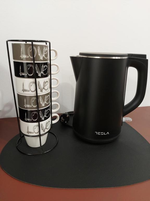 Příslušenství pro přípravu čaje a kávy v ubytování Apartment 4Leafe - Self check-in