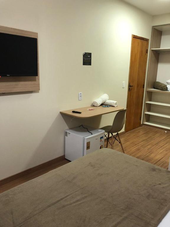 Cama ou camas em um quarto em Pousada HD
