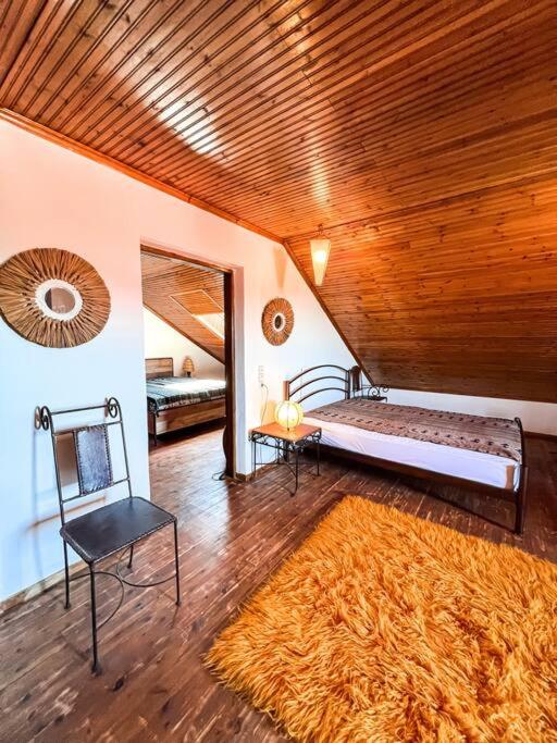 Postel nebo postele na pokoji v ubytování PANOS PALACE
