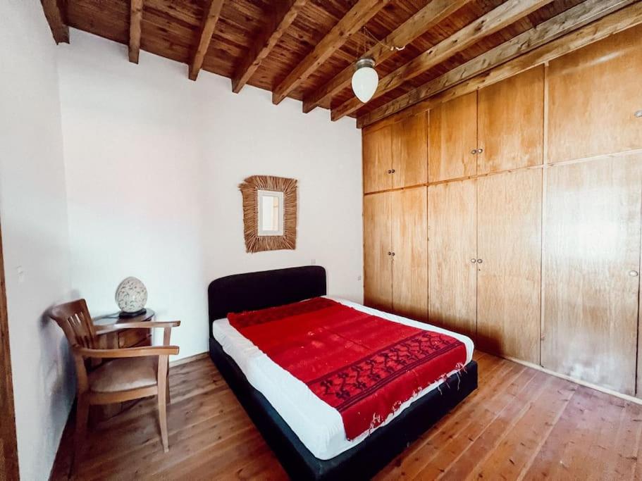 Postel nebo postele na pokoji v ubytování PANOS PALACE