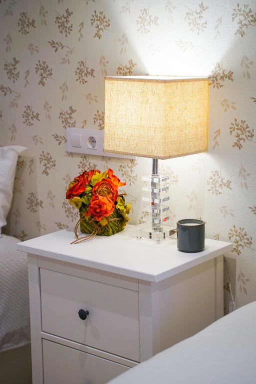 Łóżko lub łóżka w pokoju w obiekcie Homely Rooms
