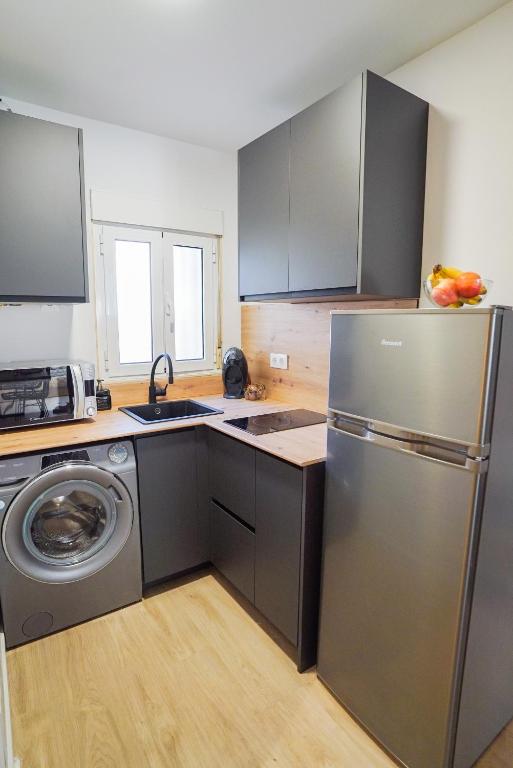 Kuchnia lub aneks kuchenny w obiekcie Homely Rooms