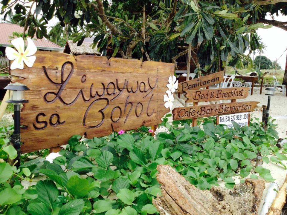 a sign for a hawaiian go bonbon at Liwayway sa Bohol Pamilacan Resort in Baclayon