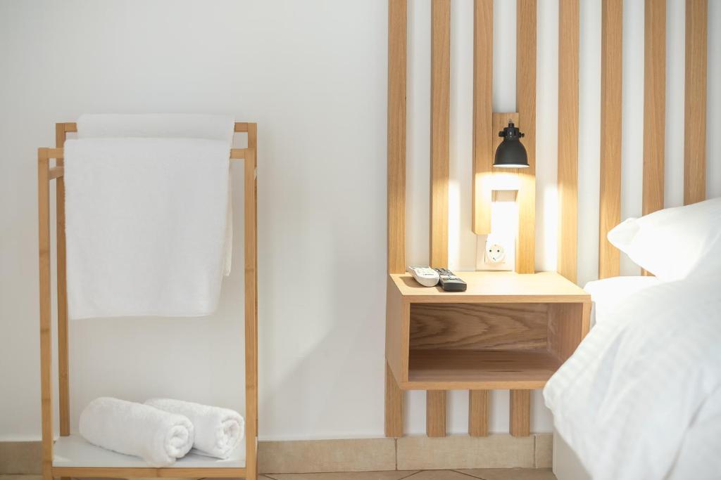 A bed or beds in a room at ATHENIAN HOME Near Acropolis