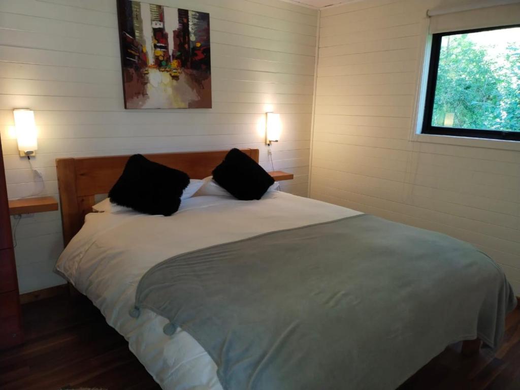 Letto o letti in una camera di Cabañas Nordic lodge