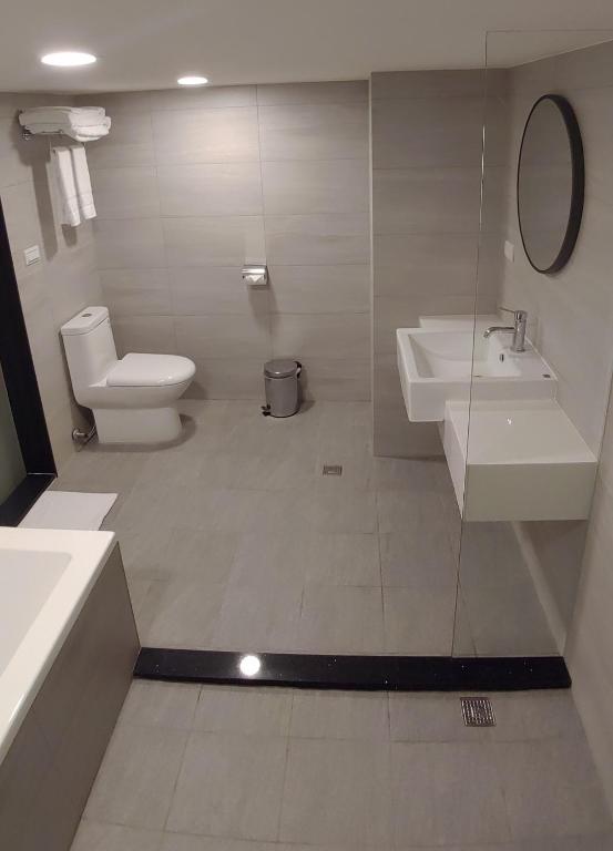 Koupelna v ubytování CY Hotel