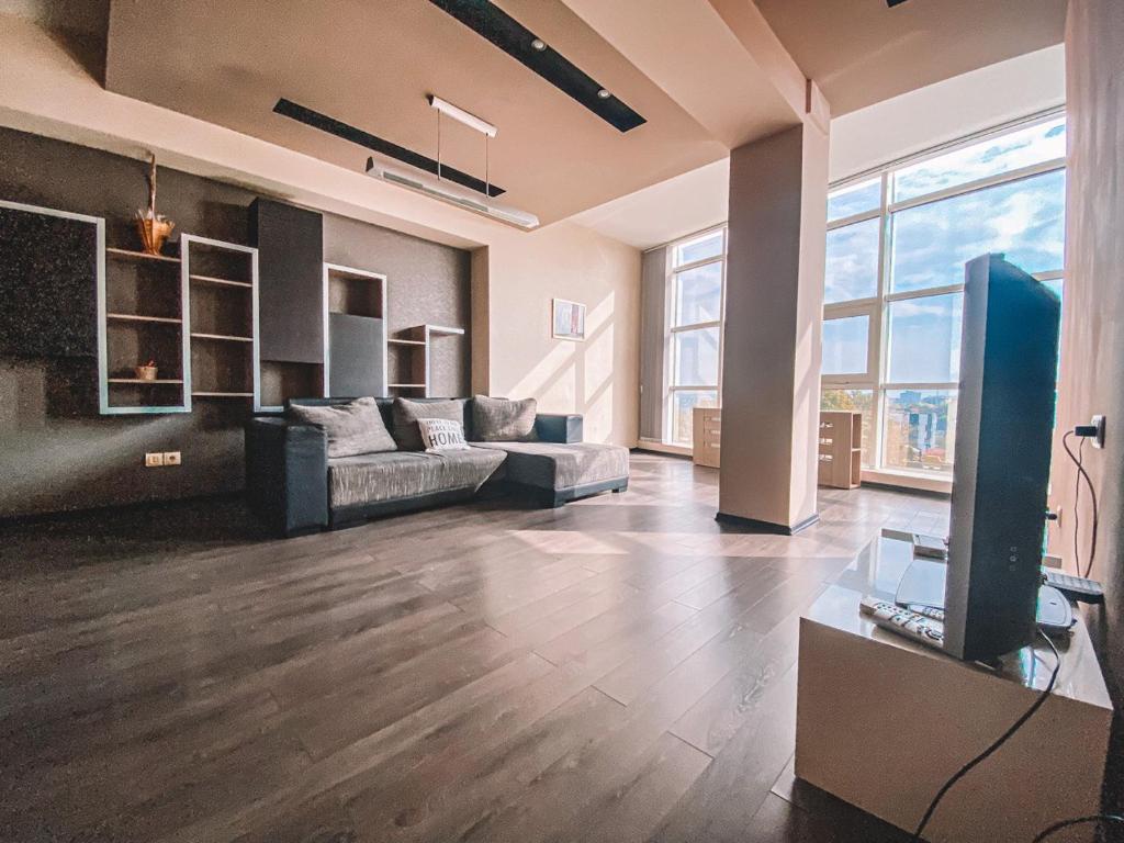 Zona d'estar a Panoramic Sky Apartment