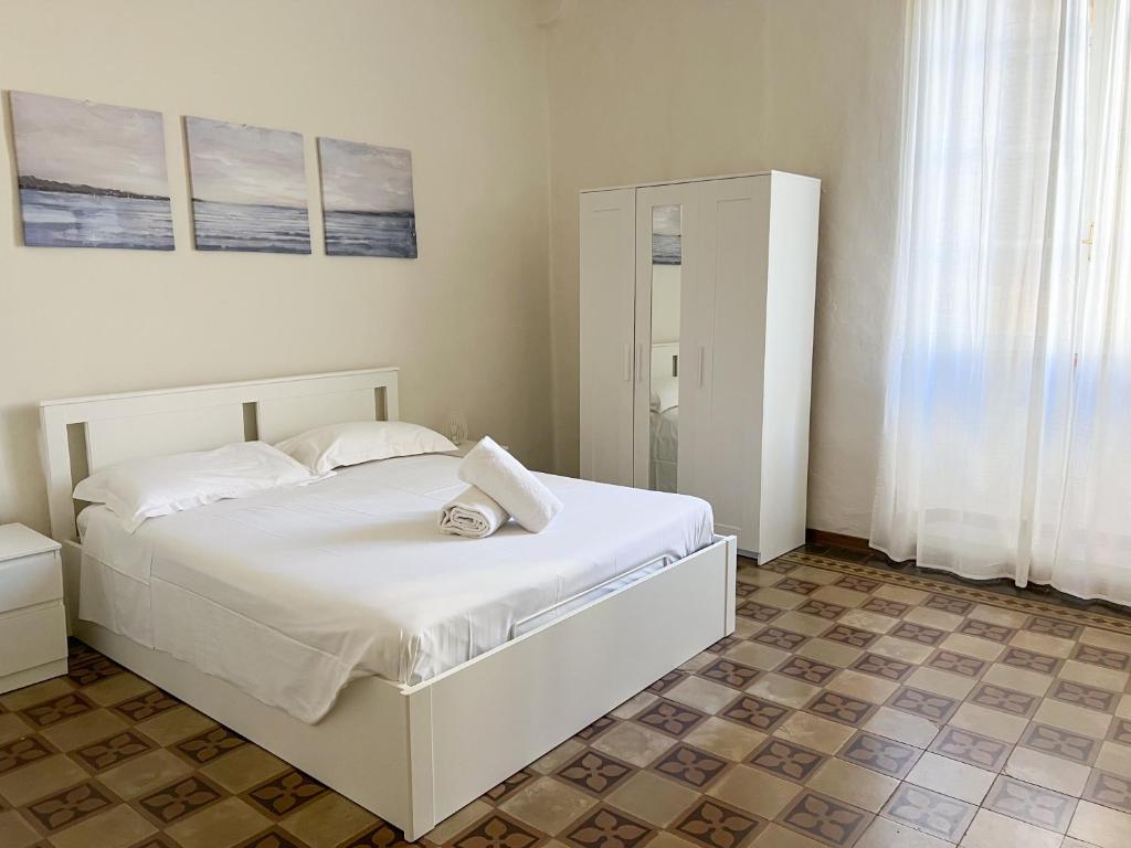 Posteľ alebo postele v izbe v ubytovaní Civico 41 Lucca City Center Apartment