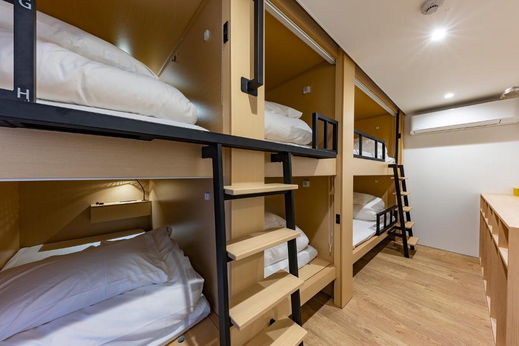 Postel nebo postele na pokoji v ubytování plat hostel keikyu kamakura wave