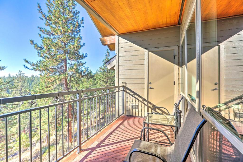 a balcony of a house with a bench on it at Breathtaking Bend Condo with Resort Amenities! in Bend