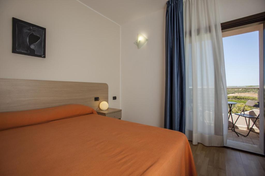 Postel nebo postele na pokoji v ubytování Mercury Boutique Hotel