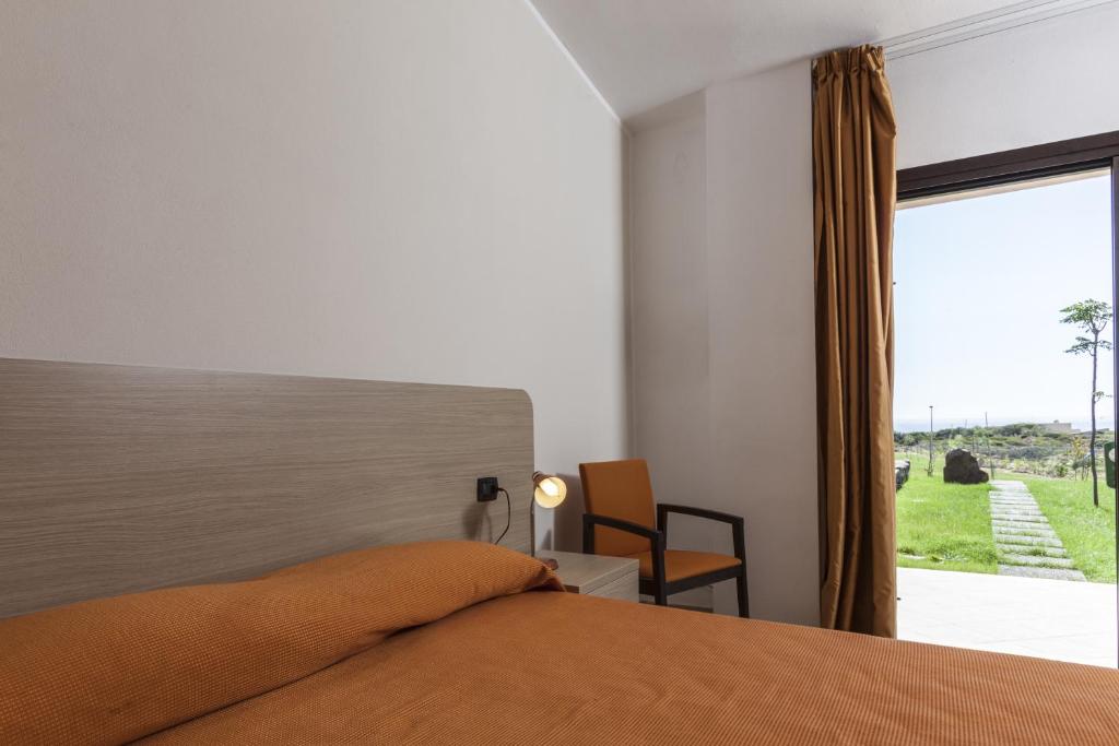 Postel nebo postele na pokoji v ubytování Mercury Boutique Hotel
