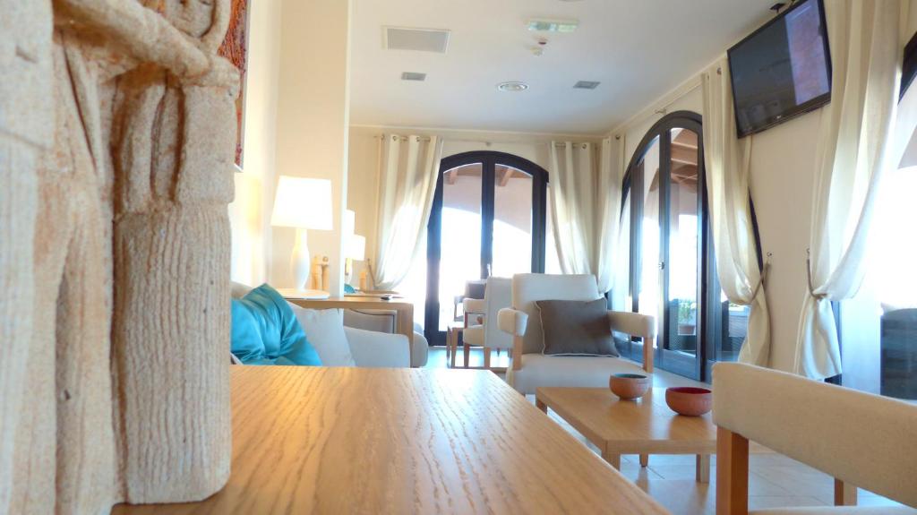 TV a/nebo společenská místnost v ubytování Mercury Boutique Hotel