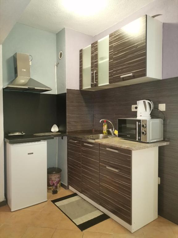 A kitchen or kitchenette at Vila Nova