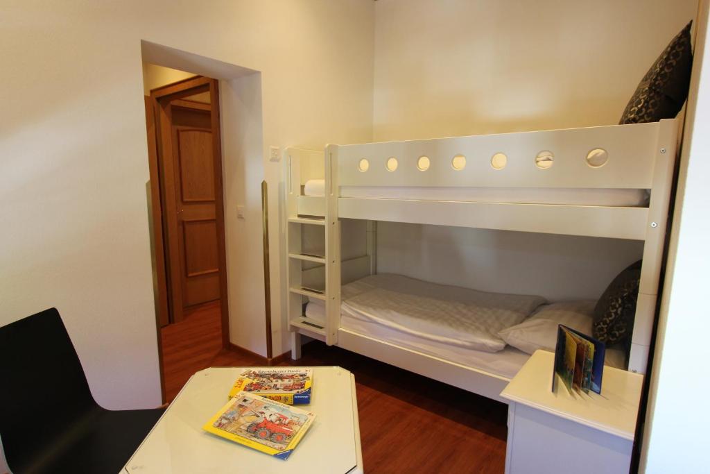 Postel nebo postele na pokoji v ubytování Toni's Alpine Loft & SPA