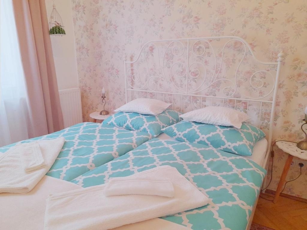 Posteľ alebo postele v izbe v ubytovaní D16 Apartman