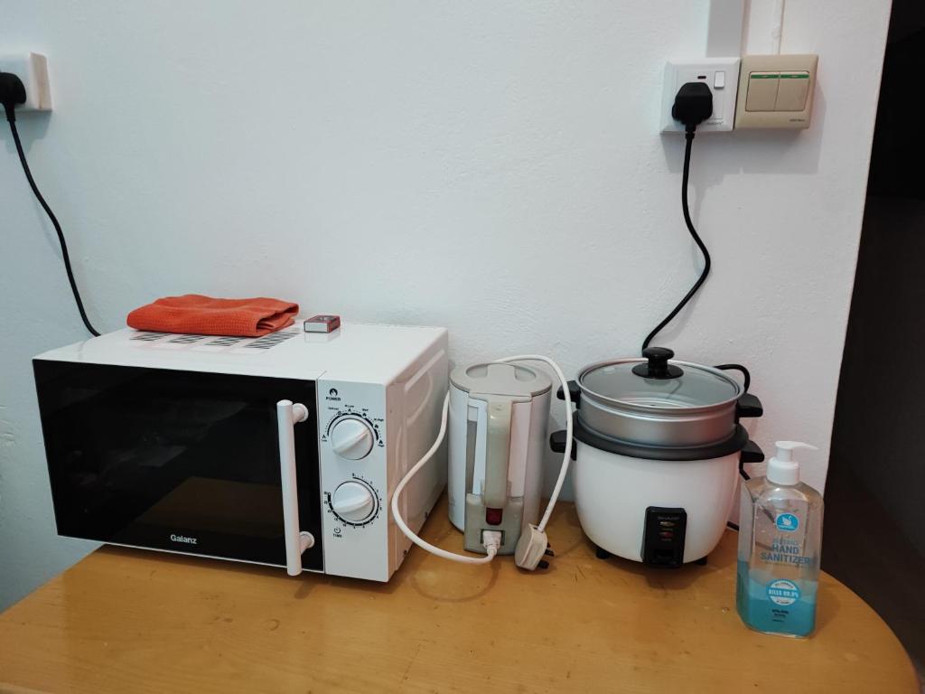 Kuchyň nebo kuchyňský kout v ubytování Ti Pavillon