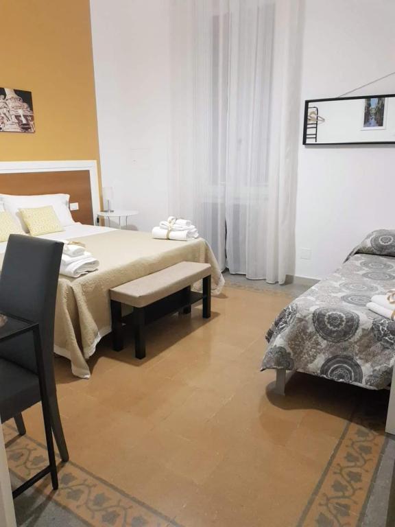 Postel nebo postele na pokoji v ubytování Aziz b&b