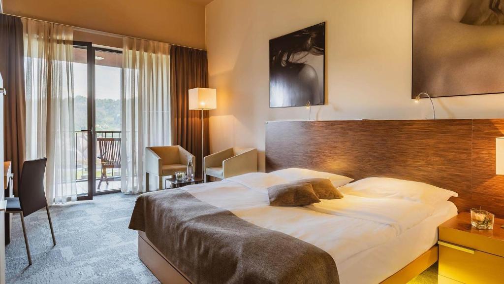 Postel nebo postele na pokoji v ubytování Terme Olimia - Hotel Sotelia