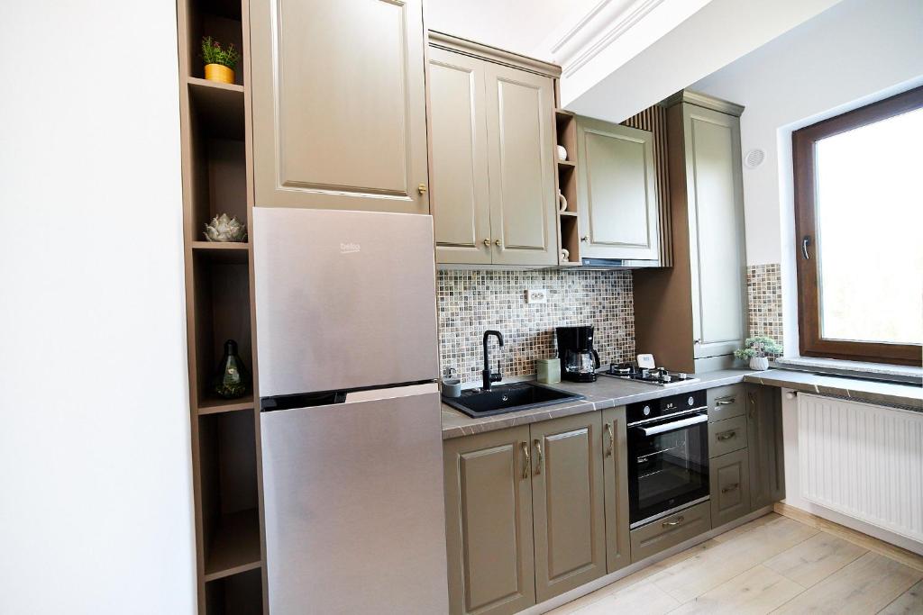 UpTown Apartments - Deluxe Studio