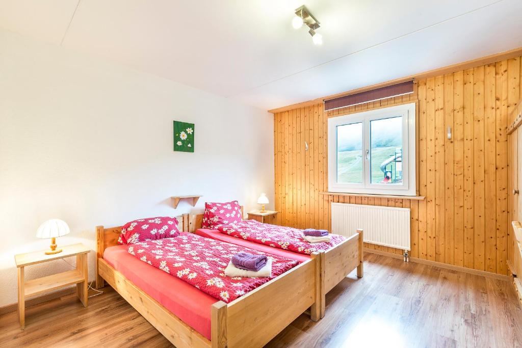 Postel nebo postele na pokoji v ubytování Heuberge