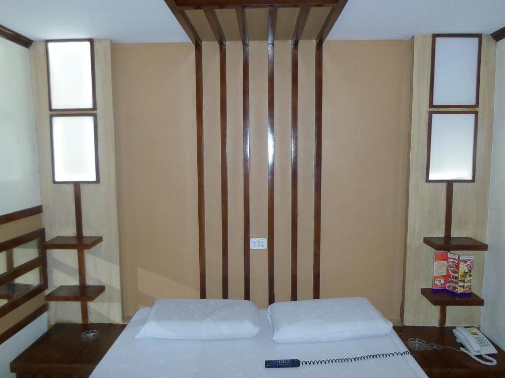 Postel nebo postele na pokoji v ubytování Hotel Sogo - EDSA, Pasay Harrison