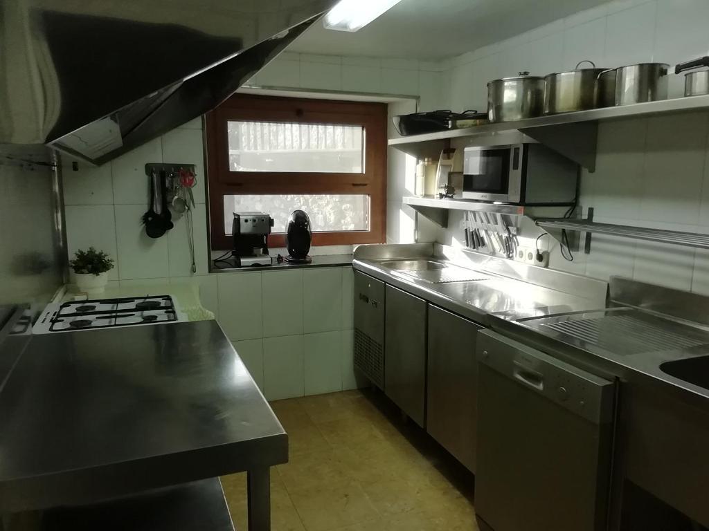 Kuchyň nebo kuchyňský kout v ubytování Casa Carlota