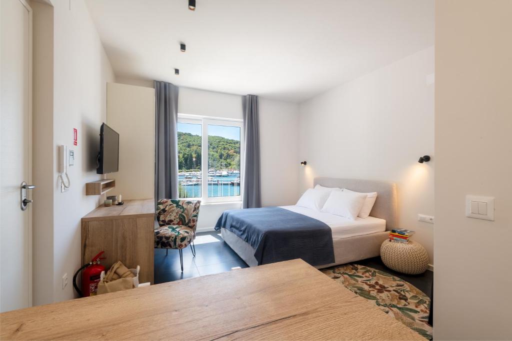 Posteľ alebo postele v izbe v ubytovaní Luxury Seaview Studio Apartment - Luna