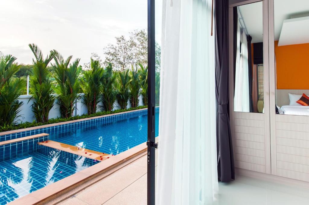 Bazén v ubytování Jinda Resort nebo v jeho okolí