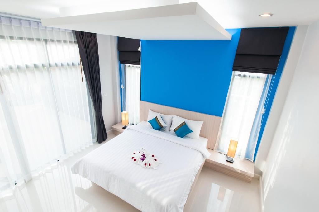 Postel nebo postele na pokoji v ubytování Jinda Resort