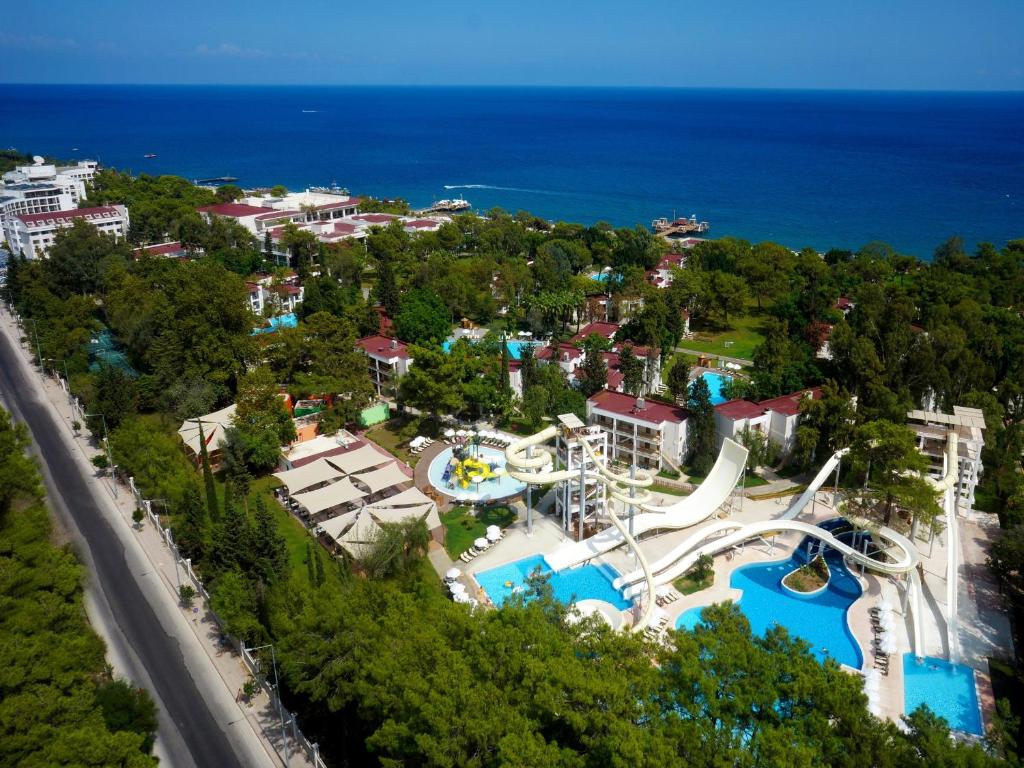 an aerial view of a water park with a roller coaster at Sherwood Exclusive Kemer - Kids Concept in Kemer