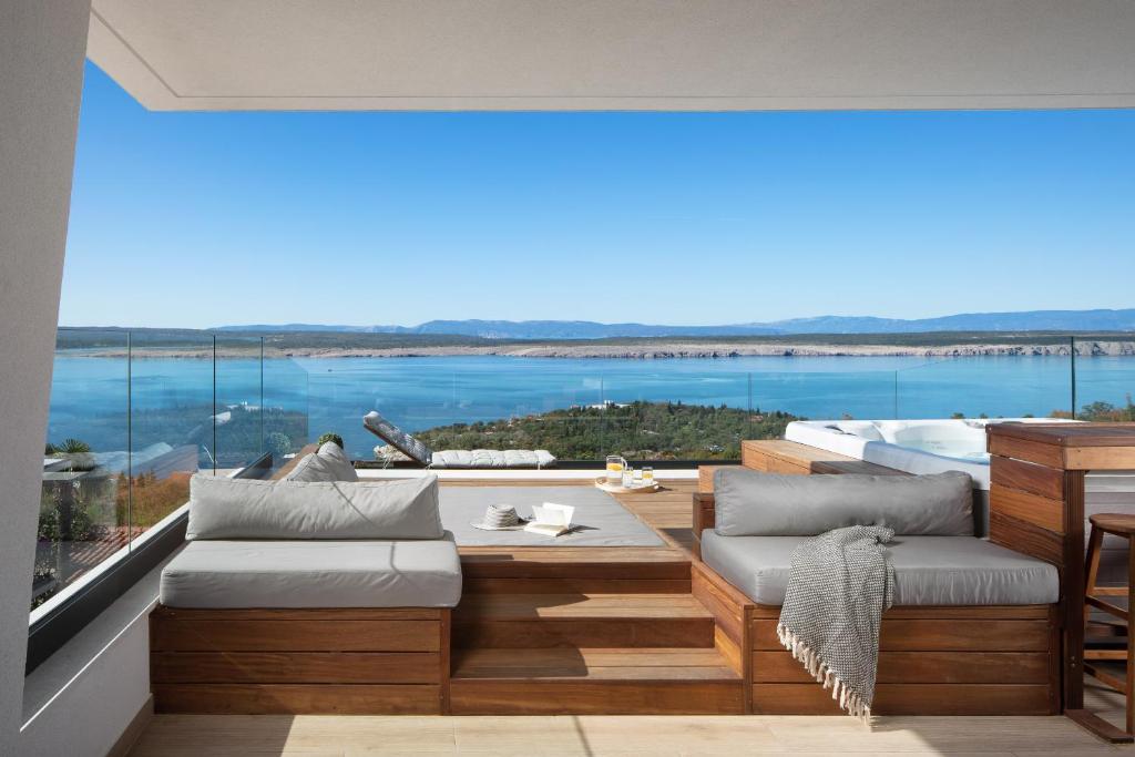 a balcony with a view of the water at Villa SPA in Dramalj