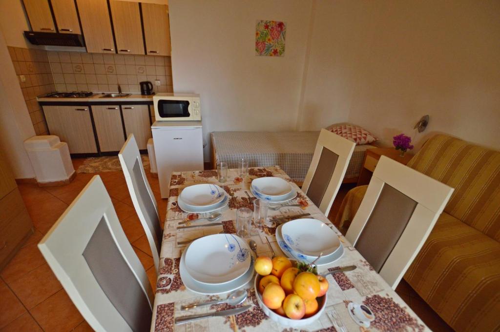 Kuchyňa alebo kuchynka v ubytovaní Apartment Vivoda