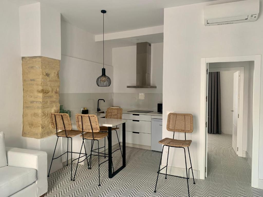 Kuchyň nebo kuchyňský kout v ubytování Apartamentos Los Patios de la Judería