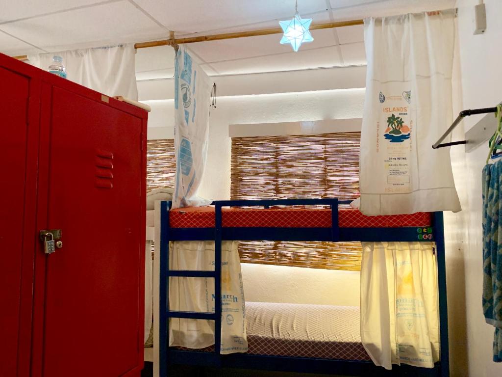 Postel nebo postele na pokoji v ubytování Moon Fools Hostel