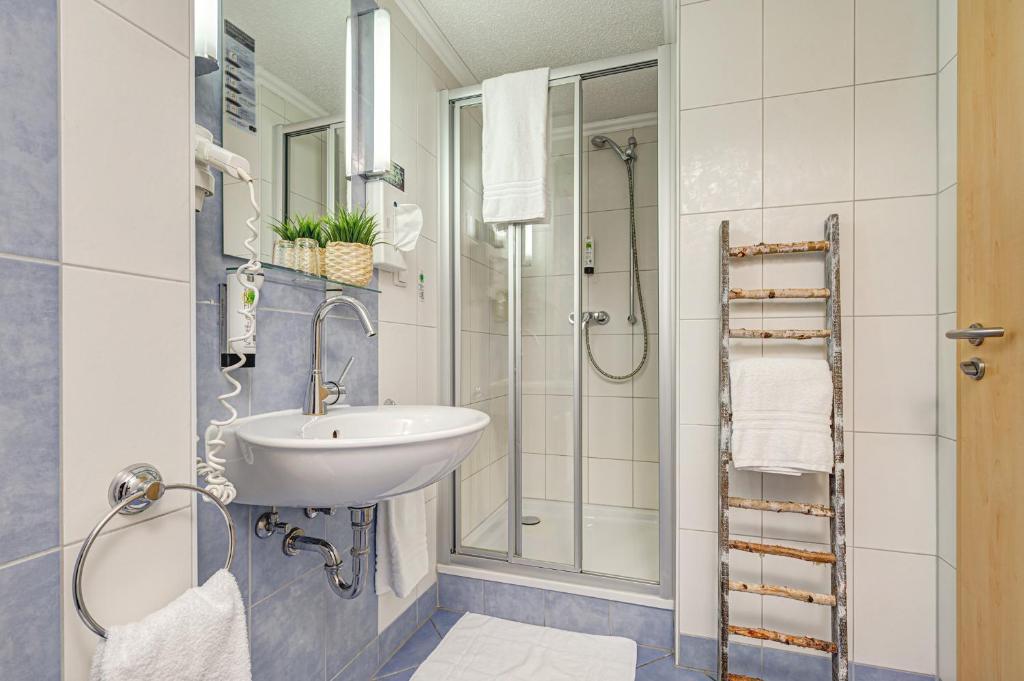 Vannituba majutusasutuses Hotel Mühlhäuser Hof