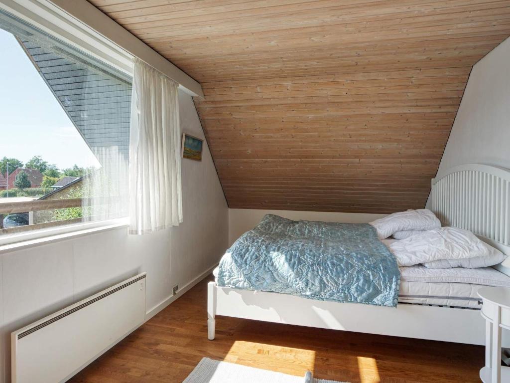 Postel nebo postele na pokoji v ubytování Holiday home Nakskov XIV