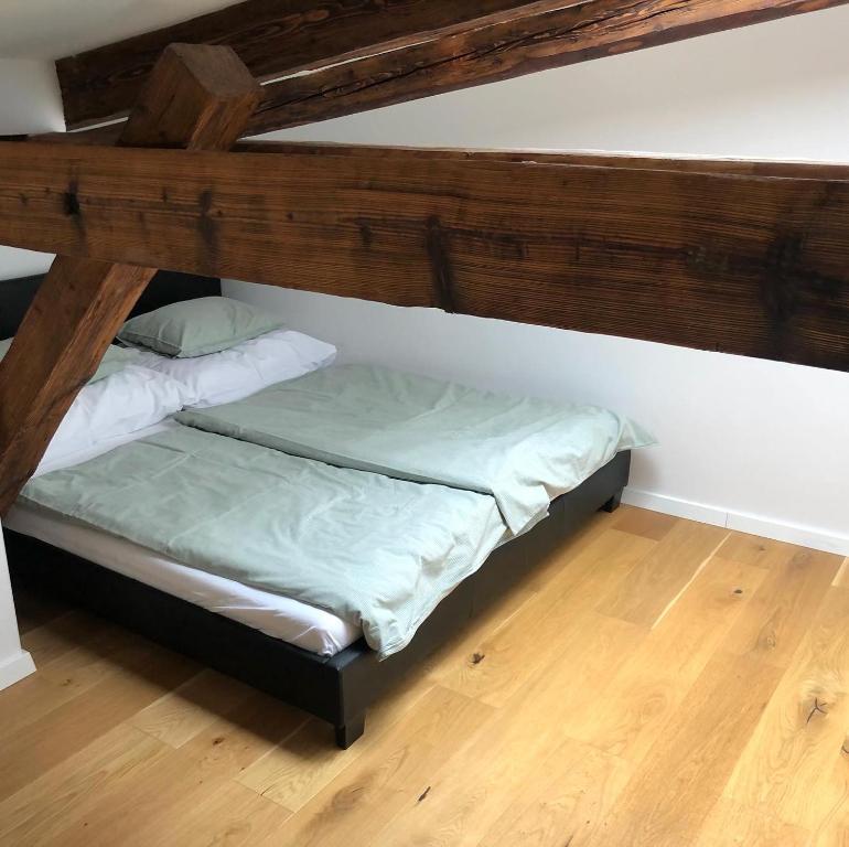 Postel nebo postele na pokoji v ubytování Loft v historickom centre