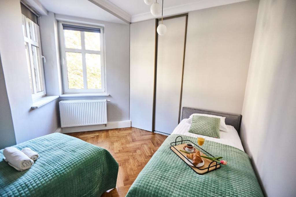 Posteľ alebo postele v izbe v ubytovaní Art Deco Apartament dla 6 osób Chorzów/Katowice 6A