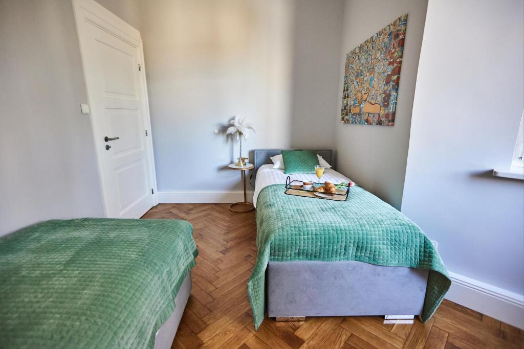 Posteľ alebo postele v izbe v ubytovaní Art Deco Apartament dla 6 osób Chorzów/Katowice 6A