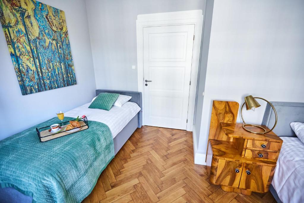 Posteľ alebo postele v izbe v ubytovaní Art Deco Apartament dla 6 osób Chorzów/Katowice 6A