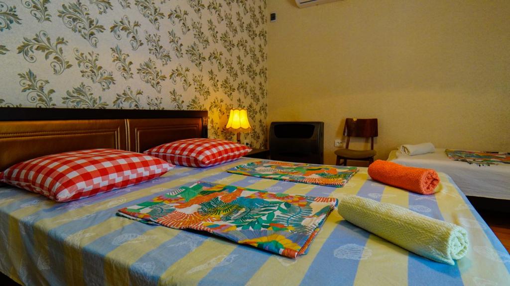 Postel nebo postele na pokoji v ubytování Guesthouse Vashlovani
